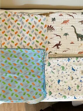 Baby Muslin Swaddle Blanket & Receiving blankets. Multi-Color Dinosaur Prints